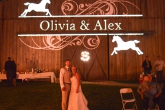 Custom Multicolored Monograms on a Barn.  Wedding at Private Residence in Bluemont, Virginia by Dominion Wedding Entertainment