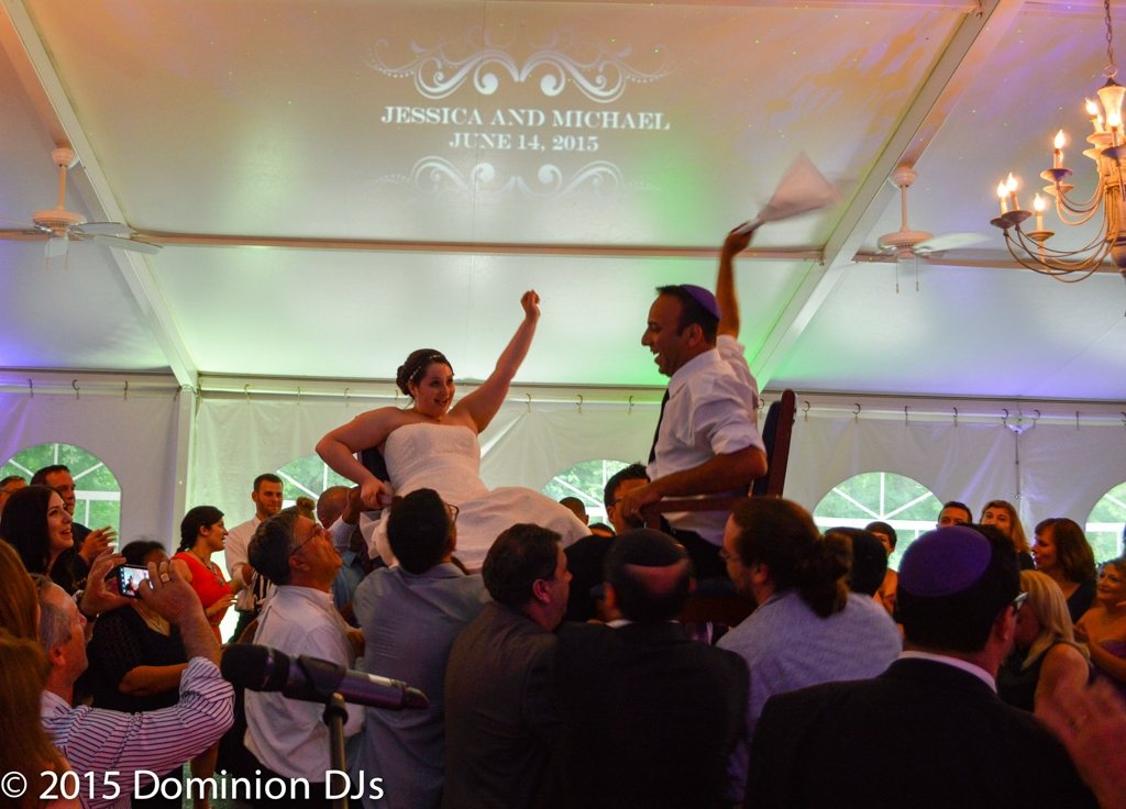 Bride and groom celebrating with guests having a blast